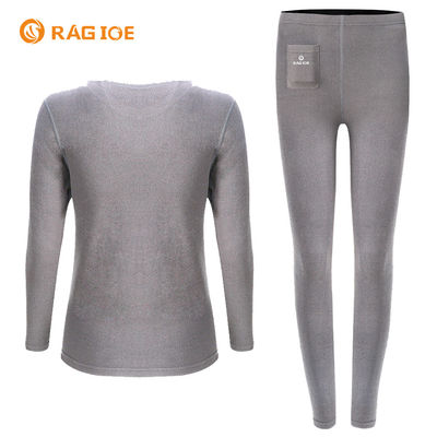 A camada baixa de aquecimento elétrica fêmea aqueceu o terno térmico do roupa interior para esportes de inverno